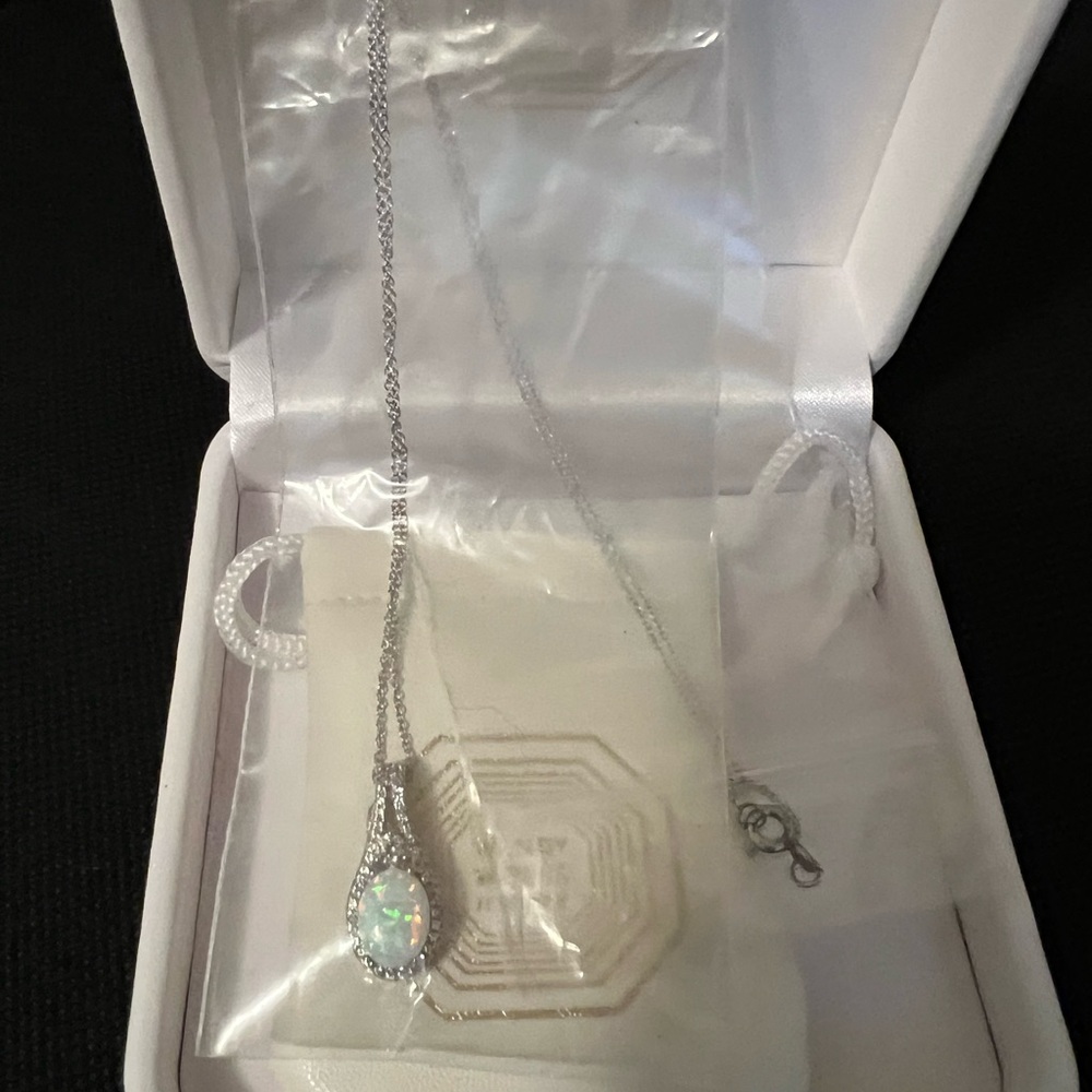Elegant Silver Necklace with Opal Pendant Helzburgs  diamonds